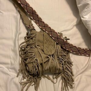 Free people purse beaded strap.